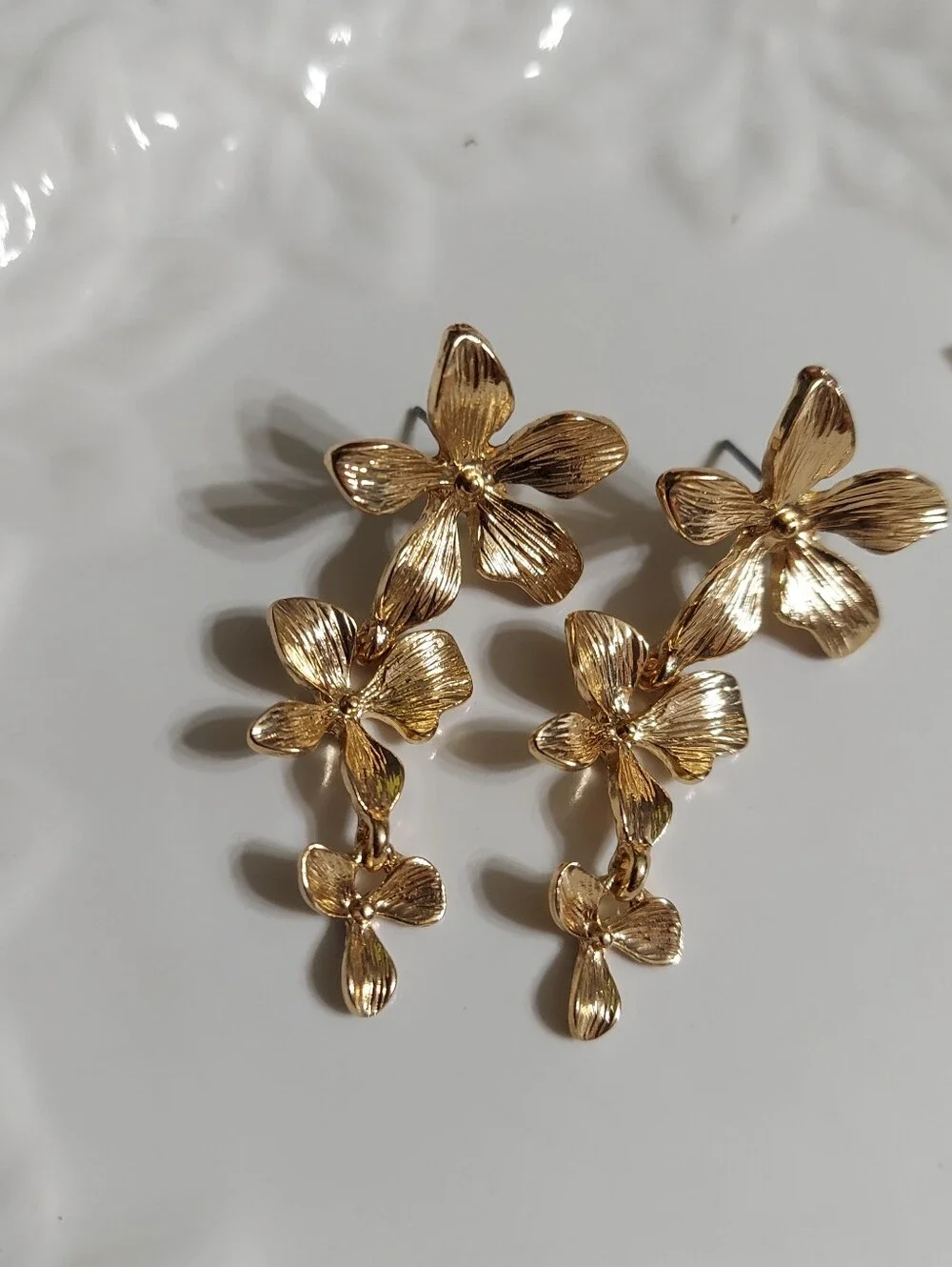 Textured Gold Tone/Dogwood Flower Trio Drop Earrings